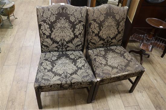 A pair of George III mahogany side chairs, with upholstered backs and seats